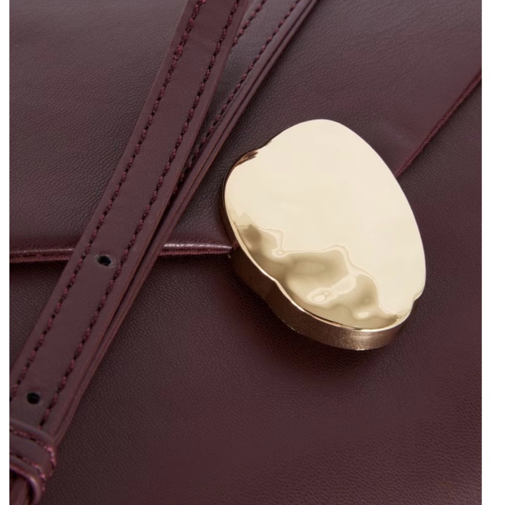 Elegant Burgundy Clutch with Gold Accent - Picture 3 of 5